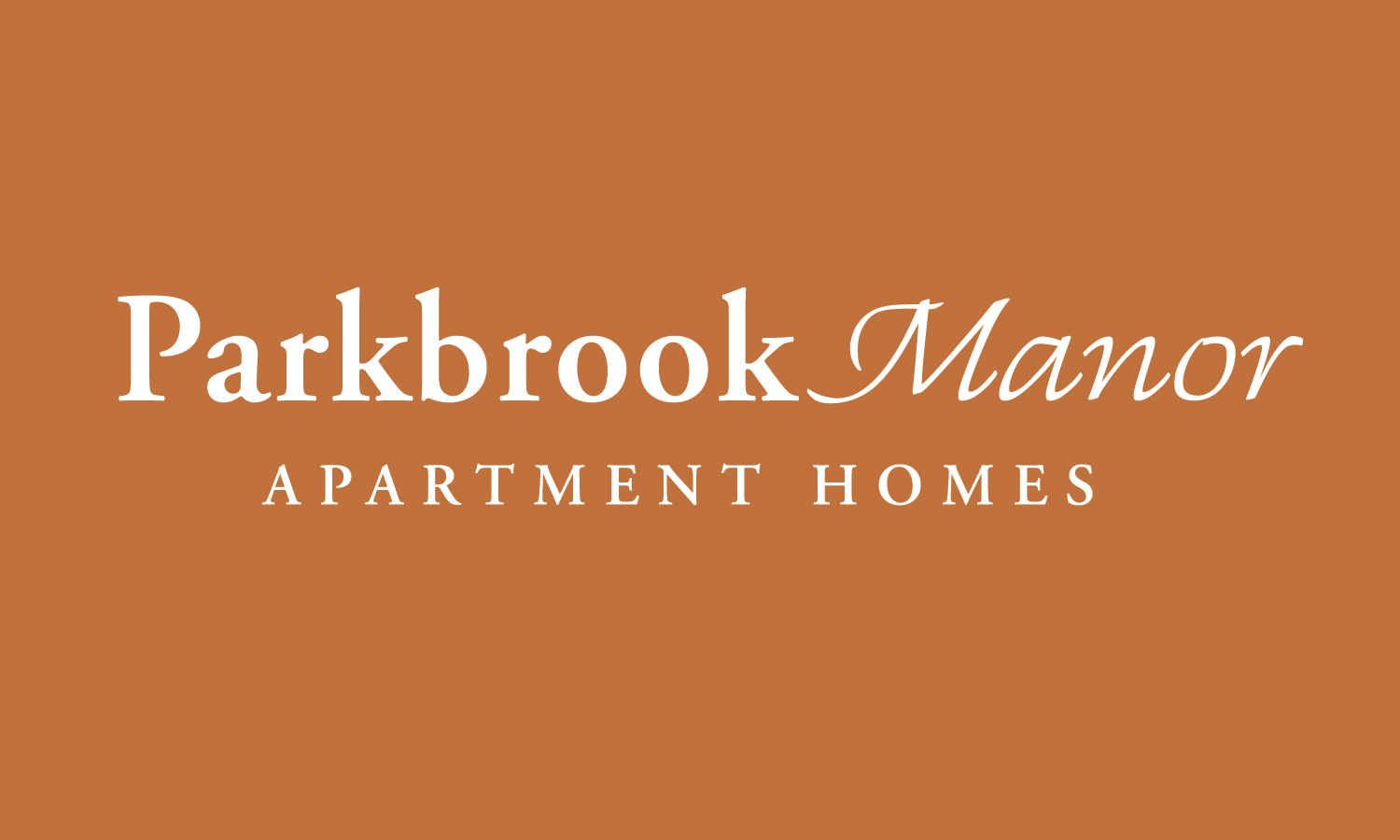 A brown background with the words Parkbrook Manor Apartment Homes.